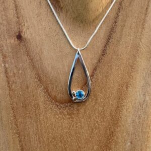 Teardrop pendant with blue topaz