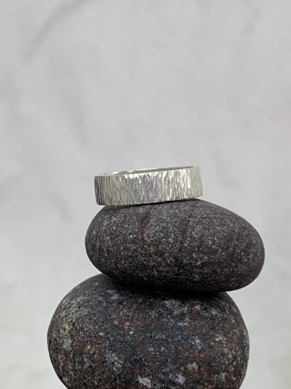 Bark effect patterned silver band ring